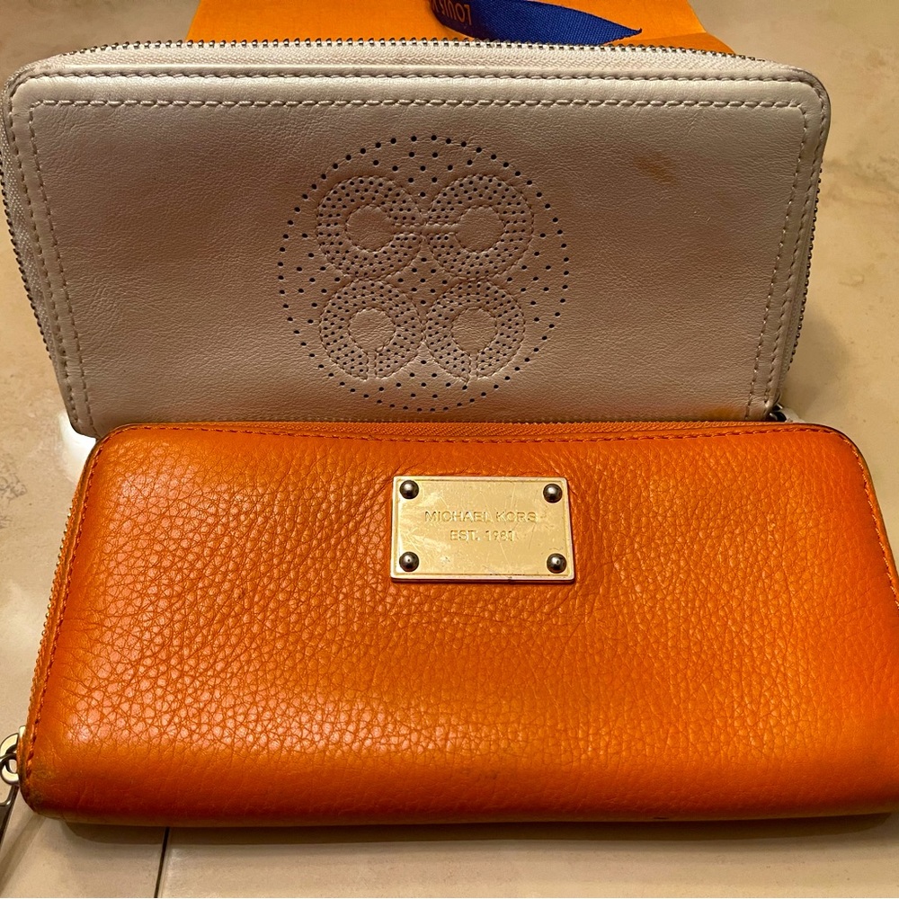 Coach white leather wallet and Michael Kors Orange Leather wallet